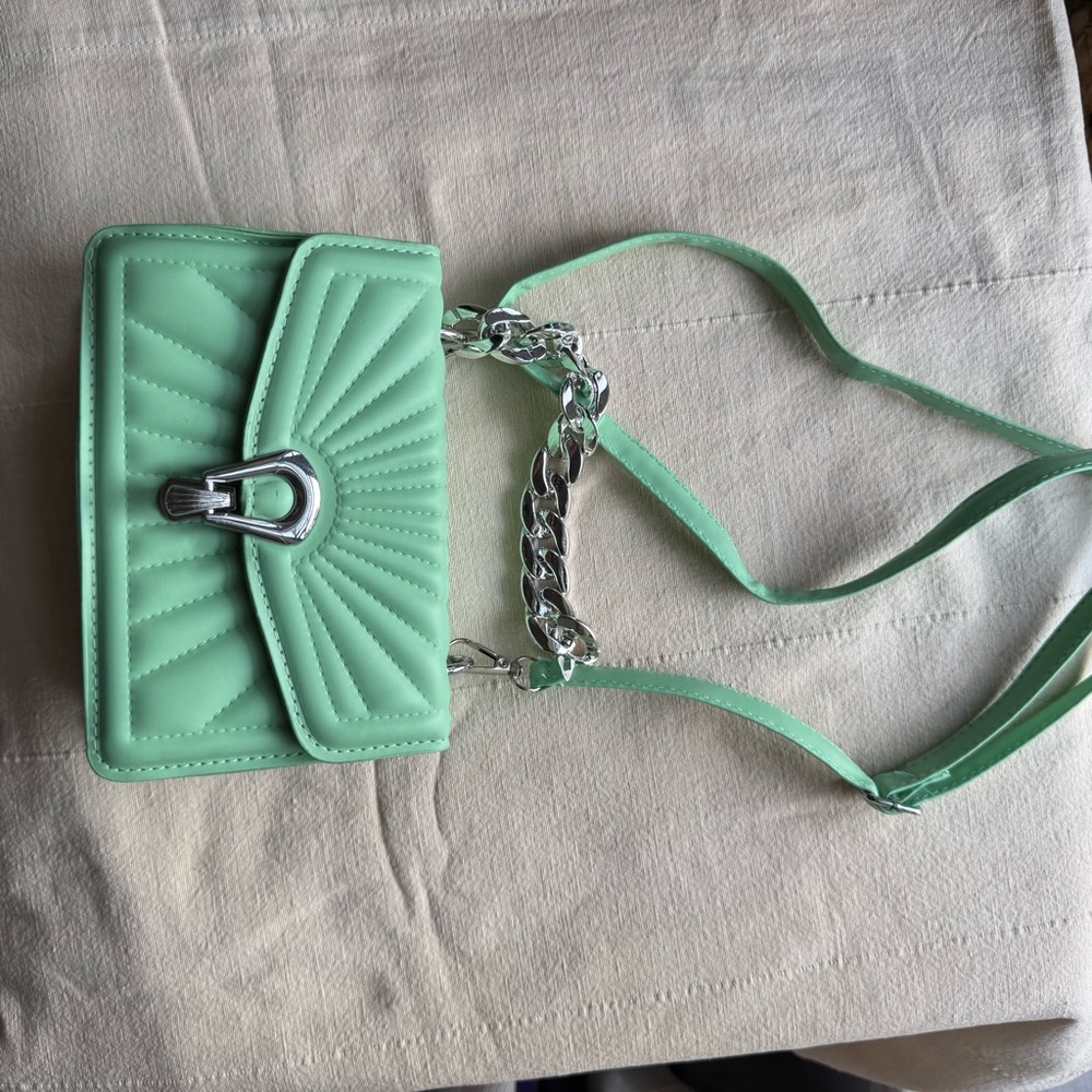 Green and Silver Crossbody Bag with Sunburst Design new without tag